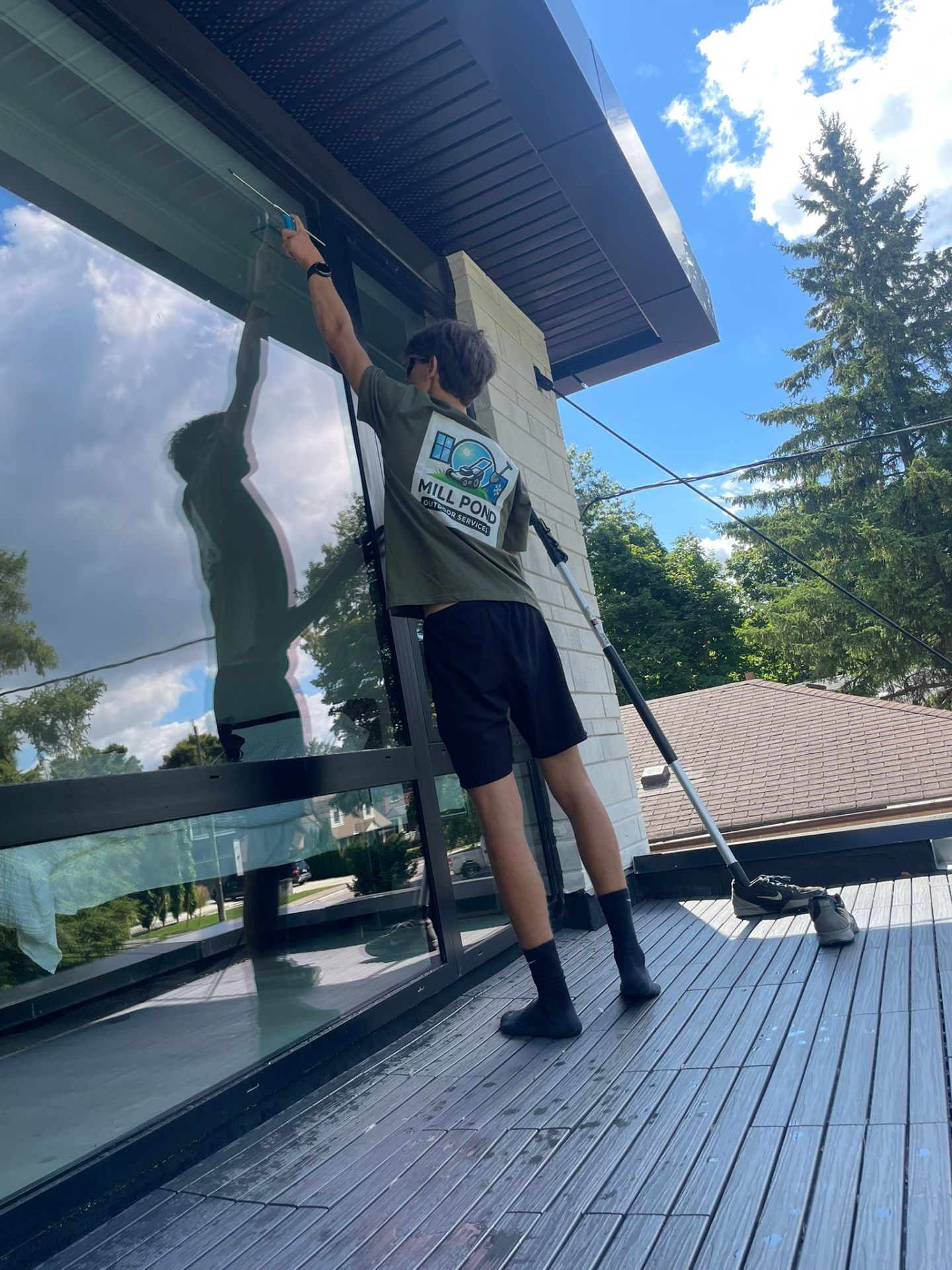 Team member washing windows